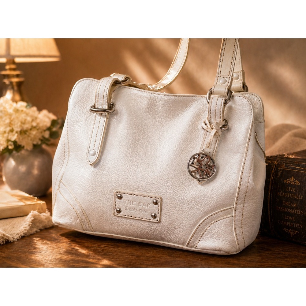 The Sak White Pebbled Leather Shoulder Bag Hobo Purse Peace Print Lining